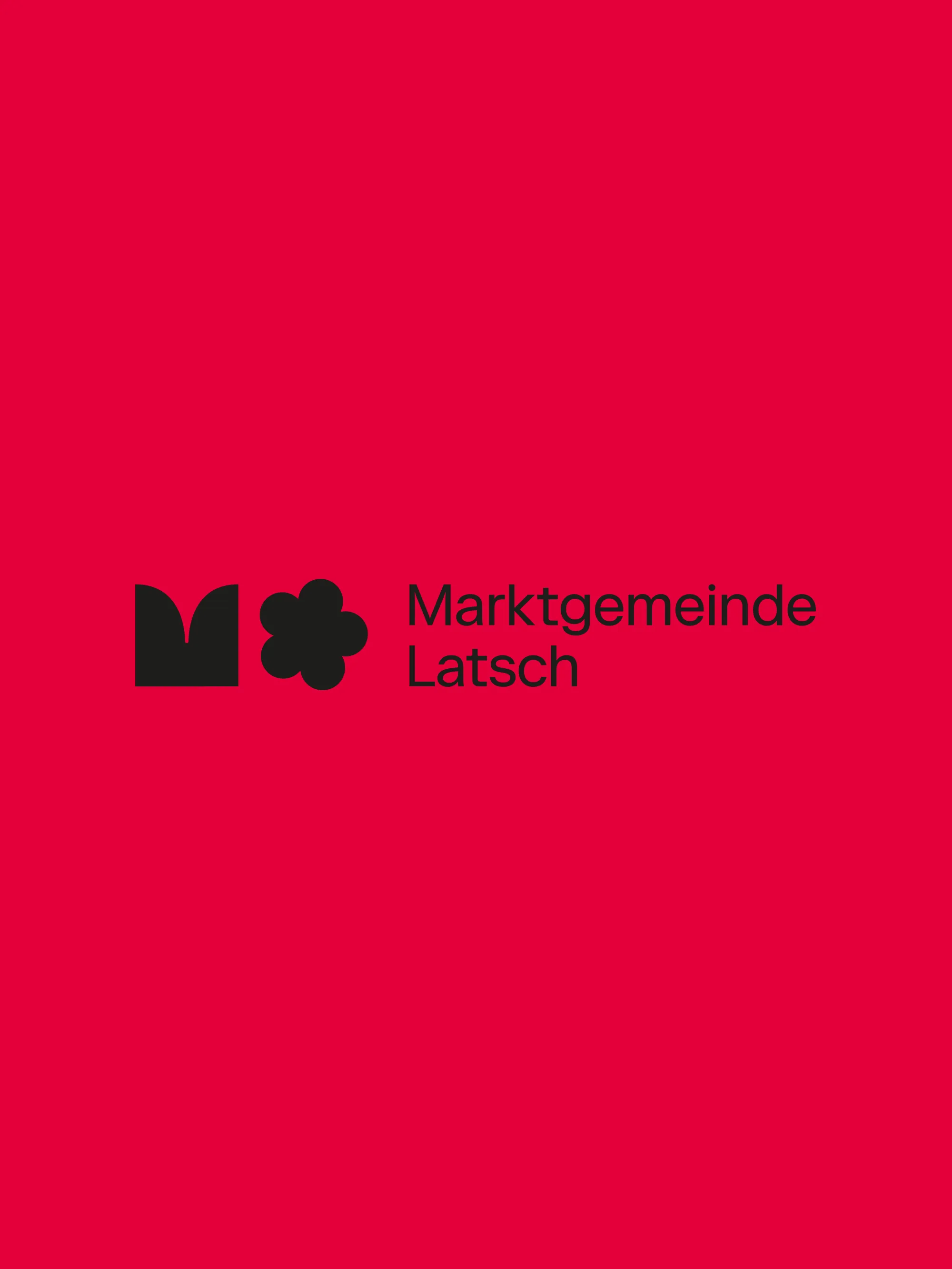Das neue Logo der Marktgemeinde Latsch auf rotem Grund